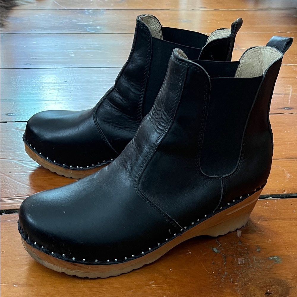 Troentorp Rockwell Black Leather Clog Boots with wooden soles.